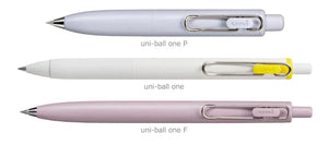 Four different colored Limited Edition Uni-Ball One F Faded Colours - 0.5MM pens with a yellow and white clip.