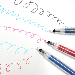 A group of Kuretake Karappo Empty Fineliner Pens with colored lines drawn on paper.