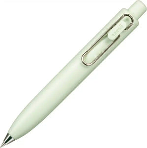 A Uni-Ball One P - Pocket Pen in Various Colours on a white surface.