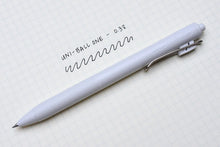 Load image into Gallery viewer, A white Limited Edition Uni-ball One Japanese Taste Pastel Colours - 0.5MM pen with writing on it on a piece of paper.
