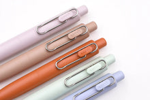 Load image into Gallery viewer, A group of Uni-Ball One P - Pocket Pens in Various Colours with a metal clip.
