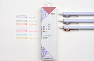 A set of Limited Edition Uni-ball One Japanese Taste Pastel Colours - 0.5MM pens and pencils on a white surface.