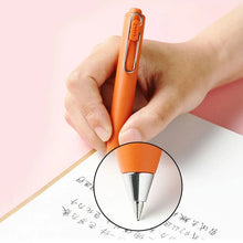 Load image into Gallery viewer, A person writing on a piece of paper with a Uni-Ball One P - Pocket Pen in Various Colours.