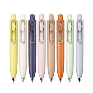 A group of Uni-Ball One P - Pocket Pens in Various Colours by uni-ball in a row.