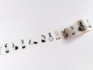 A roll of Monochrome Rabbit Washi Tape with rabbits on it.