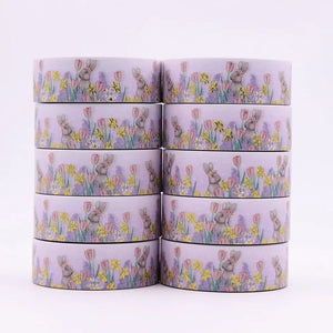 Six rolls of Gold Foil Spring Bunny Washi Tape and Spring Daffodils & Tulips Decorative Tape by GretelCreates with flowers on them.