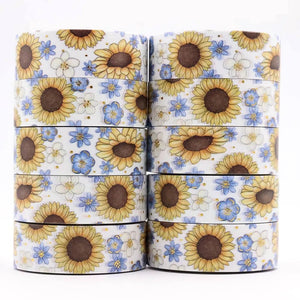 A stack of Gold Foil Sunflower Washi Tape and Blue & White Flower Decorative Tape by GretelCreates on a white background.