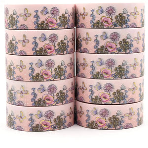 A stack of Gold Foil Summer Flowers Washi Tape with flowers and butterflies on it, brand name GretelCreates.