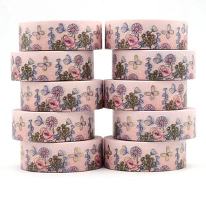 A stack of Gold Foil Summer Flowers and Pink Daisy Decorative washi tape with flowers and butterflies from GretelCreates.