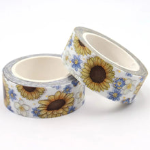 Load image into Gallery viewer, Two rolls of Gold Foil Sunflower Washi Tape and Blue &amp; White Flower Decorative Tape by GretelCreates on a white surface.