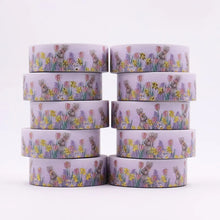 Load image into Gallery viewer, A stack of Gold Foil Spring Bunny Washi Tape, Spring Daffodils &amp; Tulips Decorative Tape with flowers on it by GretelCreates.