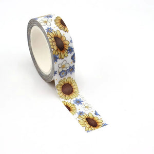A roll of Gold Foil Sunflower Washi Tape, Blue & White Flower Decorative Tape with sunflowers on it by GretelCreates.