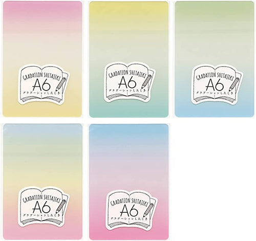 A set of four Kyoei Plastics A6 Shitajiki Ombre Pastel Pencil Board notebooks with the word aa written on them.