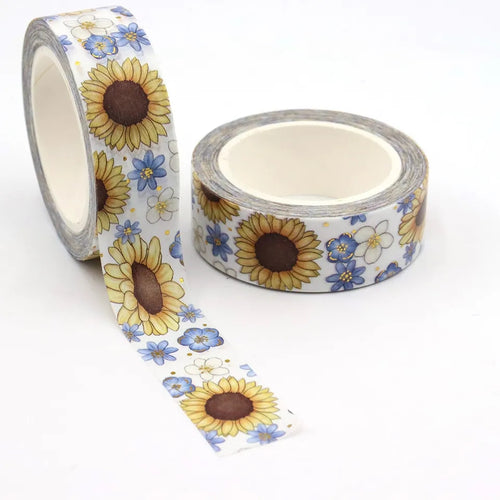 Two rolls of Gold Foil Sunflower Washi Tape and Blue & White Flower Decorative Tape by GretelCreates on a white surface.
