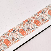 Load image into Gallery viewer, A GretelCreates notebook with a Vintage Style Happy Mail Washi Tape - 30mm orange and white pattern on it.