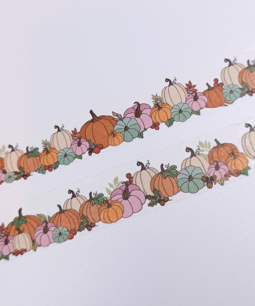 Two strips of Autumn Pumpkin Washi Tape with pumpkins on them by GretelCreates.