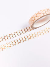 Load image into Gallery viewer, A roll of 10mm Peach and Gold Honeycomb Washi Tape available at the UK Washi Shop.