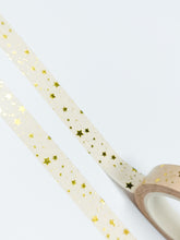 Load image into Gallery viewer, GretelCreates 10mm Gold Stars Washi Tape with gold stars on a white surface.