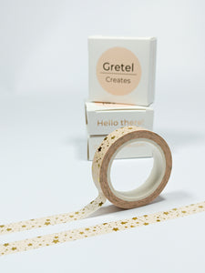 A Peach and Gold Stars Washi Tape by GretelCreates with a box, available in the UK.