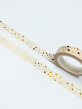Load image into Gallery viewer, A roll of 10mm gold foil GretelCreates Washi Tape with peach and gold stars.