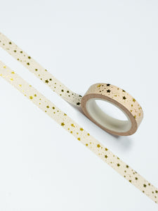 A roll of 10mm Peach and Gold Foil Stars Washi Tape by GretelCreates.