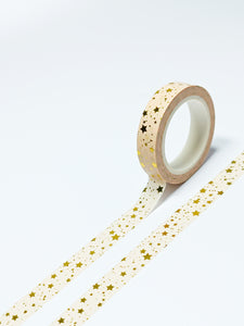 A roll of 10mm Foil Washi Tape in a beige color by GretelCreates.