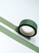 Load image into Gallery viewer, A roll of Minimal Dark Olive Green Plain Washi Tape by GretelCreates on a white surface.