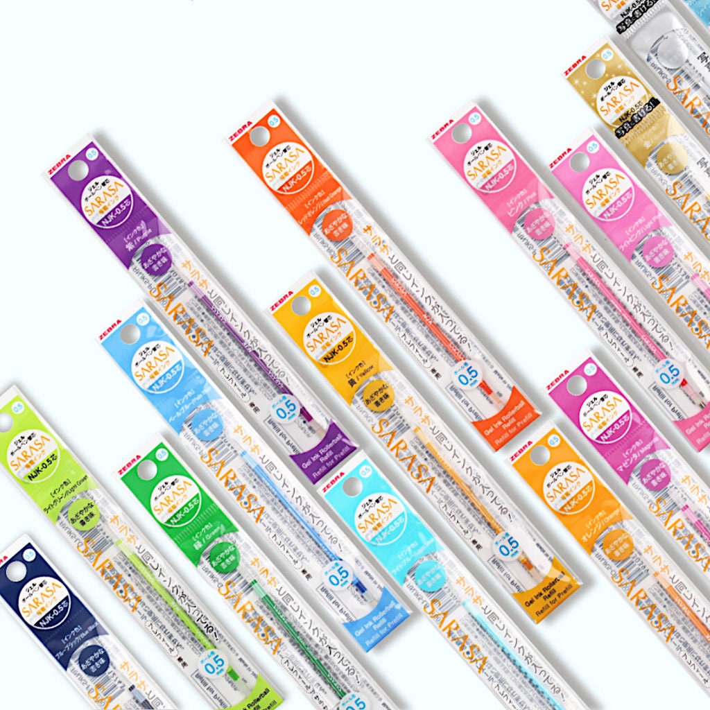 A row of different colored Zebra Sarasa Select Ink Refills toothbrushes on a white background.